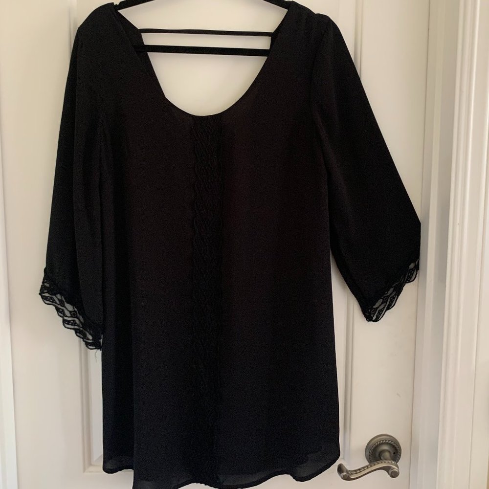 black longsleeve shift dress with lace detailing